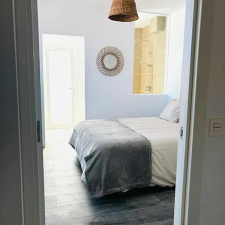 Tami Villa *